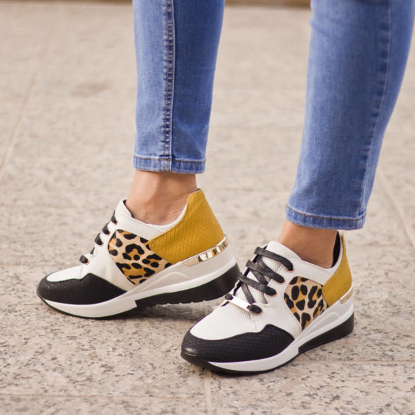 Fekete-fehér-sárga Menbur női sneakers cipő emelt sarokkal.