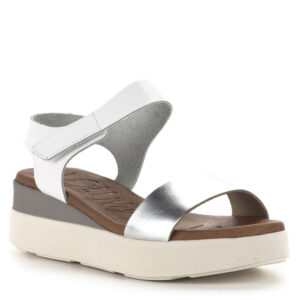 Oh My Sandals szandál fehér-ezüst színkombinációban, vastag talppal, tépőzáras pánttal. Az Oh My Sandals szandálok kényelmes, puha talpbéléssel, Spanyolországban készülnek. Anyaguk kívül belül valódi bőr.
